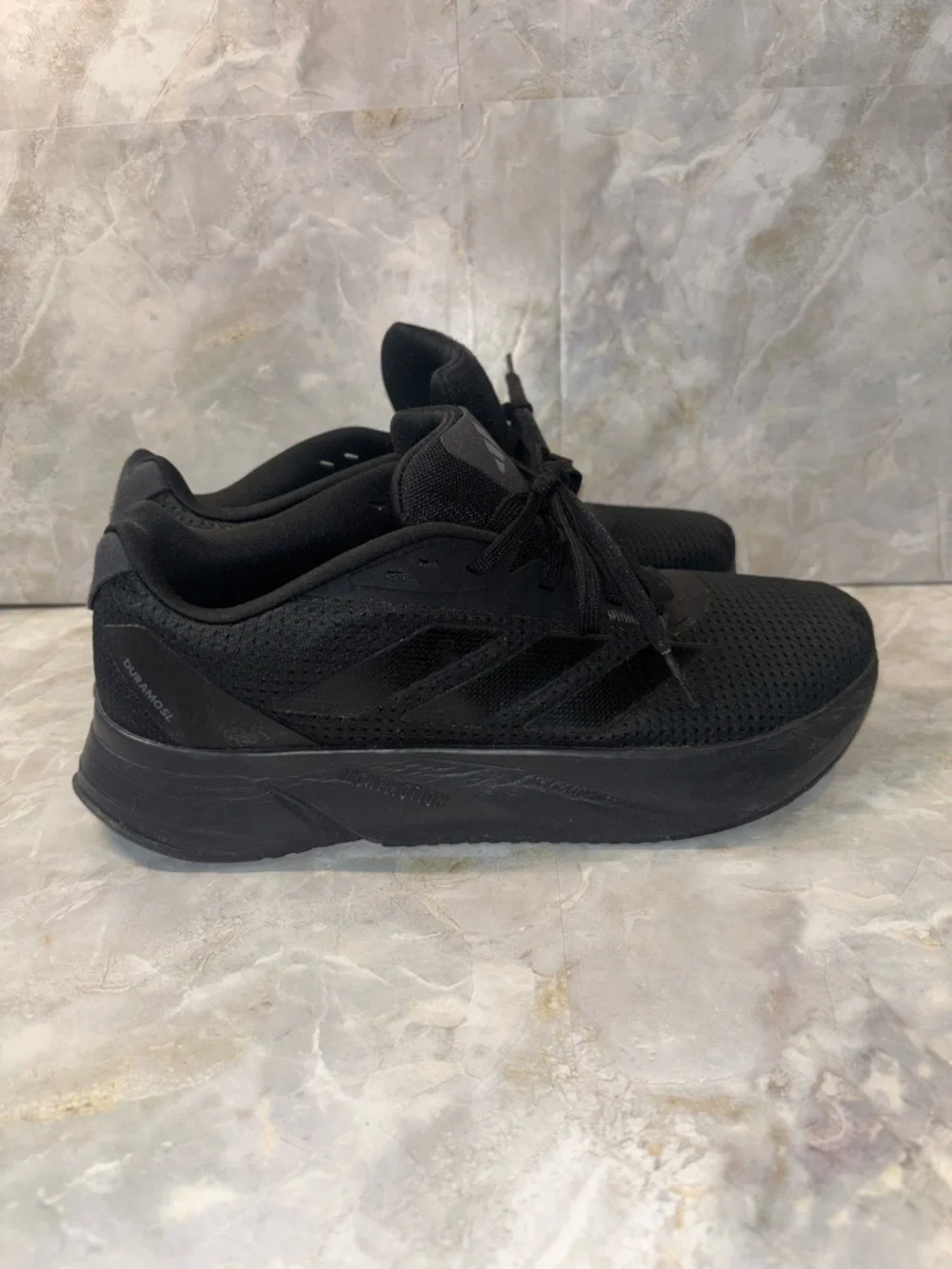 Adidas’s All-Black Mesh Training Sneakers